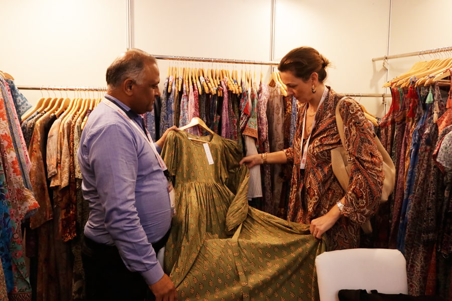Pradeep Nahata (L) MD, Karni Exports, Jaipur, seen here interacting with a buyer, also got few new buyers